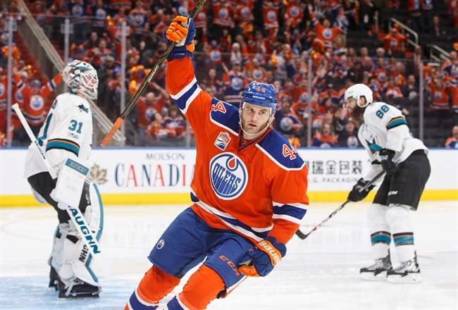 San Jose Sharks' Martin Jones (31) and Brent Burns (88) react as Edmonton Oilers' Zack Kassian (44) celebrates his goal during second period NHL playoff action in Edmonton, Alta., on Friday April 14, 2017. THE CANADIAN PRESS/Jason Franson.