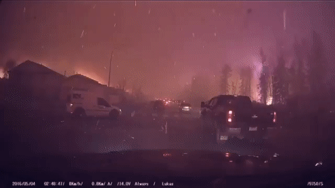 Video taken during the May 3, 2016 evacuation showing fire and ash raining down on traffic moving slowly though the Beacon Hill neighbourhood, which was one of the hardest hit during the May 2016 wildfire in Fort McMurray, Alta.