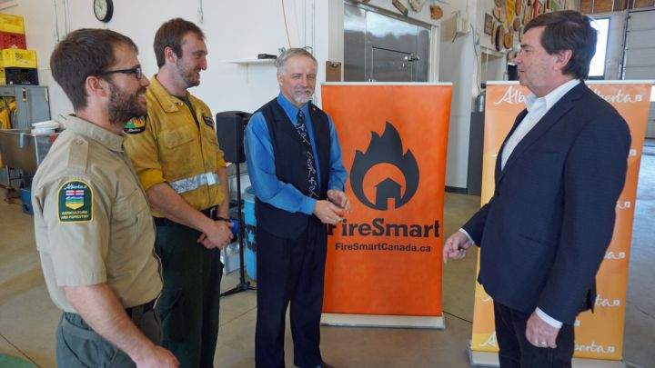The Alberta government says it will spend $45 million over the next three years to help protect communities from wildfires.