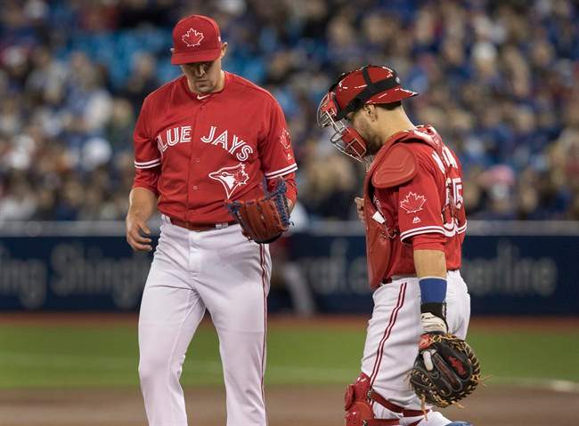 Blue Jays pitcher Aaron Sanchez is forced to leave Sunday's game vs. Tampa Bay with a split finger nail.