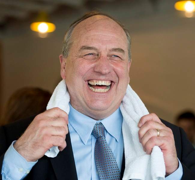 B.C. Green Party leader Andrew Weaver shares a laugh prior to a news conference in Vancouver, B.C., Monday, April 24, 2017. 