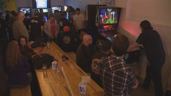 Players compete during a Manitoba Pinball League night at The Good Will in Winnipeg.