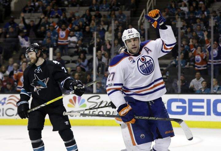 Edmonton Oilers' Milan Lucic (27) celebrates after scoring against the San Jose Sharks during the third period of an NHL hockey game Thursday, April 6, 2017, in San Jose, Calif. 