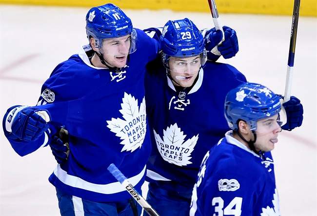 Toronto Maple Leafs centre Zach Hyman (11) celebrates his goal with teammates William Nylander (29) and Auston Matthews (34) during round one playoff action against the Washington Capitals in Toronto on April 19, 2017.