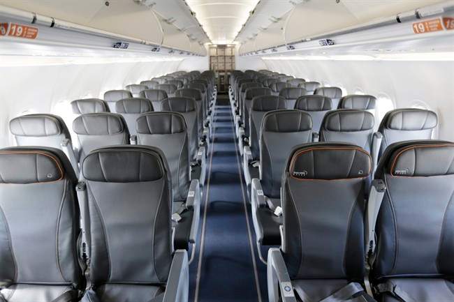 This Thursday, March 16, 2017, file photo shows the interior of a commercial airliner at John F. Kennedy International Airport in New York. 