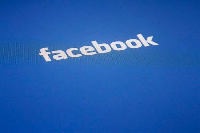 FILE - In this Wednesday, May 16, 2012, file photo, a Facebook logo is displayed on the screen of an iPad, in New York. A Halifax-area navy sailor has been jailed three years for sexually assaulting a woman he met over Facebook.