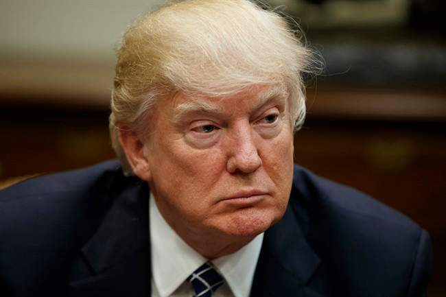 FILE - In this Tuesday, March 28, 2017, file photo, President Donald Trump listens during a meeting with the Fraternal Order of Police, in the Roosevelt Room of the White House in Washington. (AP Photo/Evan Vucci, File.