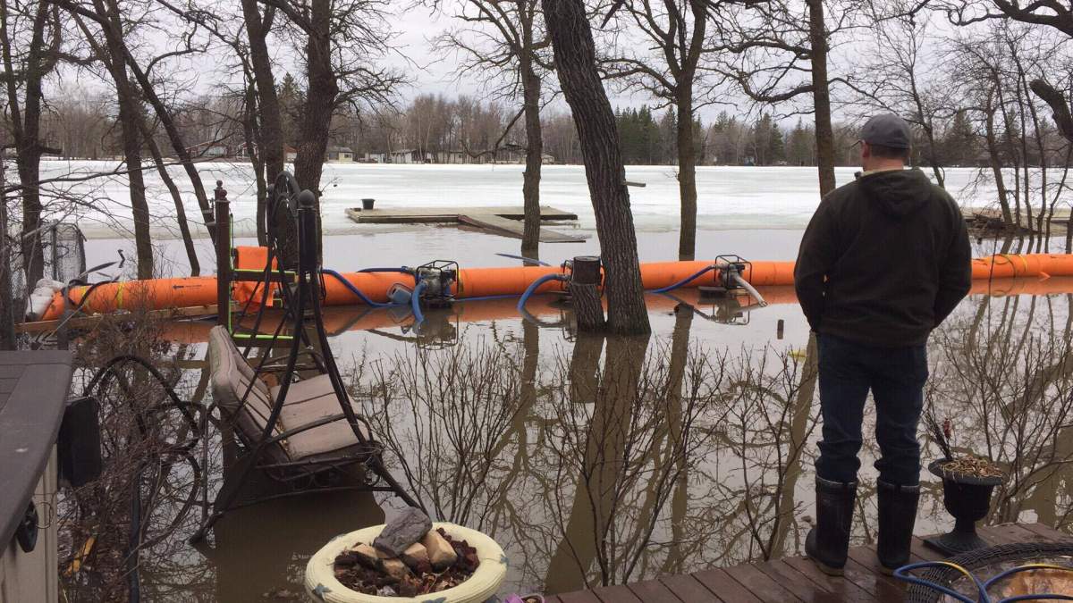 Families in Petersfield, Manitoba await sandbags to save their properties from flooding.