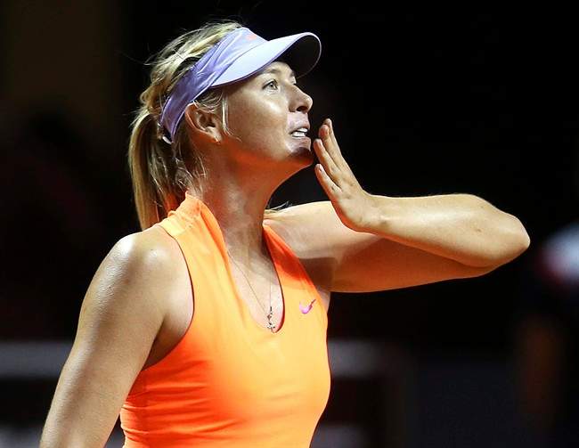 Russia's Maria Sharapova blows a kiss after winning 7-5, 6-3 against Italy's Roberta Vinci at the Porsche Tennis Grand Prix in Stuttgart, Germany, Wednesday, April 26, 2017. It was Sharapova's first match after a 15-month doping ban.