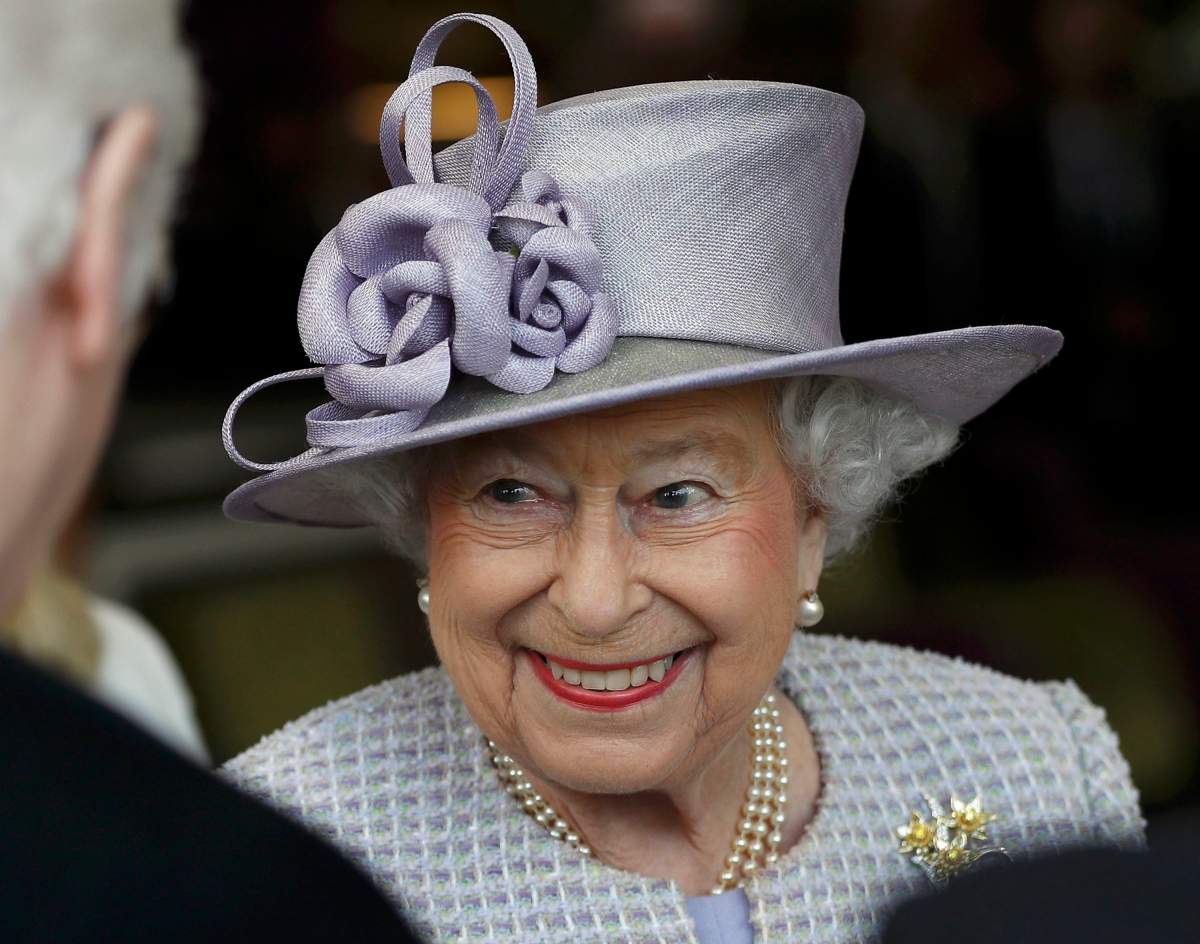 FILE - This is a Tuesday, April 11, 2017 file photo of Britain's Queen Elizabeth as she meets residents during a visit to Priory View, an independent living scheme for older residents, in Dunstable, England, Tuesday, April 11, 2017. Britain's Queen Elizabeth celebrates her 91st birthday on Friday, April 21, 2017. 