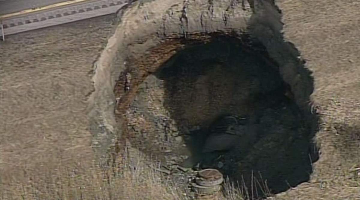 A giant sinkhole has closed part of Highway 25 in Saint-Roch-de-l'Achigan, Thursday, April 13, 2017.
