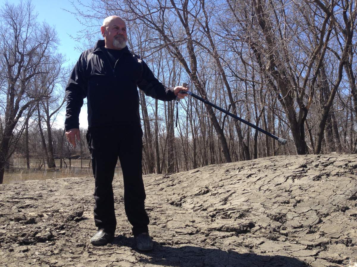 Stephen Burdy said his property would be completely flooded if it wasn\’t for a home made dike he built.