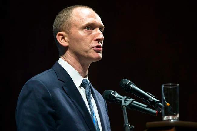In this Friday, July 8, 2016, file photo, Carter Page, then adviser to U.S. Republican presidential candidate Donald Trump, speaks at the graduation ceremony for the New Economic School in Moscow, Russia.