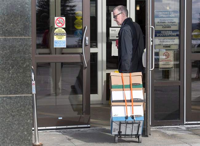 Federal Crown prosecutor Paul Adams arrives at court for the start of the RCMP's trial on violating four charges of the Canada Labour Code in Moncton, N.B. on Monday, April 24, 2017.