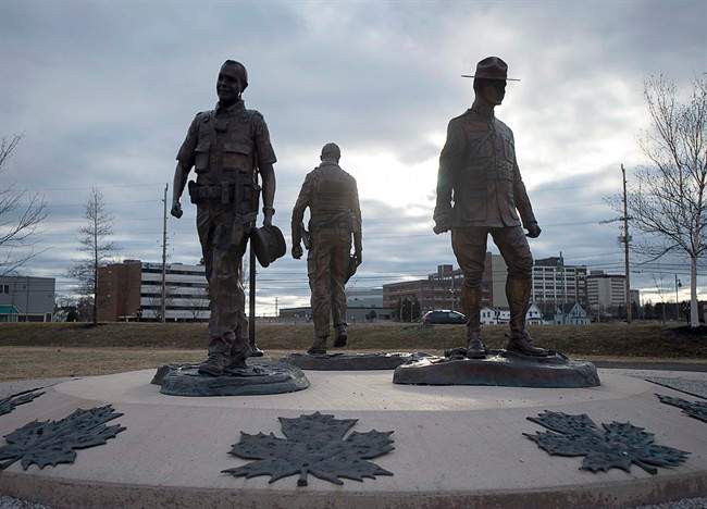A memorial to the three RCMP officers who were gunned down three years ago, is seen in Moncton, N.B. on Sunday, April 23, 2017. 