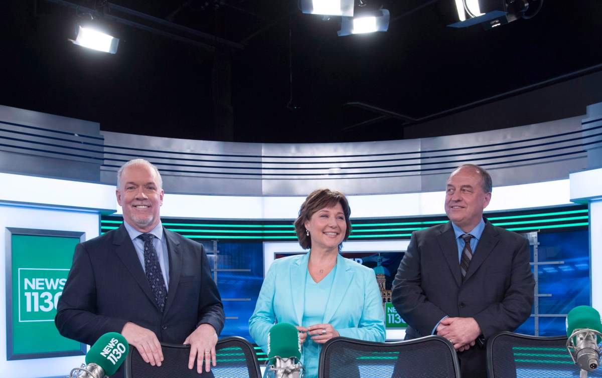B.C. NDP leader John Horgan, left to right, Liberal Leader Christy Clark and B.C. Green Party leader Andrew Weaver pose for a photo following the leaders debate in Vancouver, B.C., Thursday, April 20, 2017