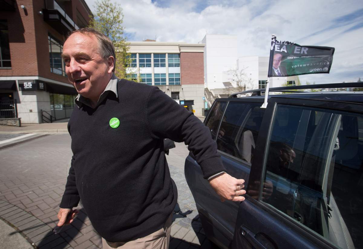 Green Party Leader Andrew Weaver gets out of a vehicle to stop to talk to reporters outside a campaign stop by NDP Leader John Horgan in Nanaimo, B.C., on Friday May 5, 2017. A provincial election will be held on Tuesday.