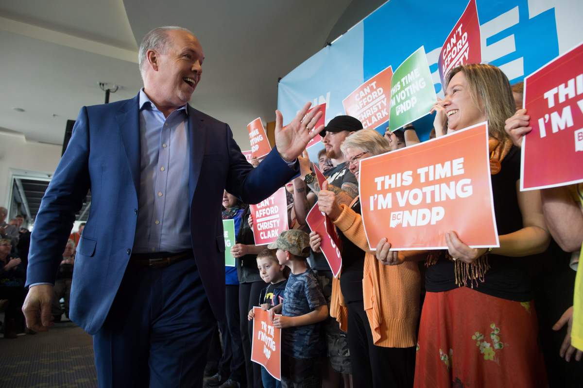 NDP Leader John Horgan greets supporters during a campaign stop in Nanaimo, B.C., on Friday May 5, 2017. A provincial election will be held on Tuesday.