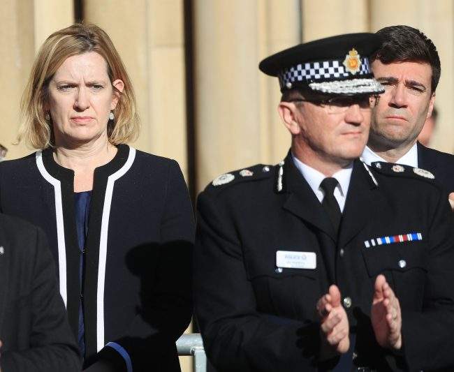 Home Secretary Amber Rudd (L), Greater Manchester Police chief constable Ian Hopkins and Mayor of Greater Manchester Andy Burnham attend a vigil in Albert Square outside Manchester Town Hall.