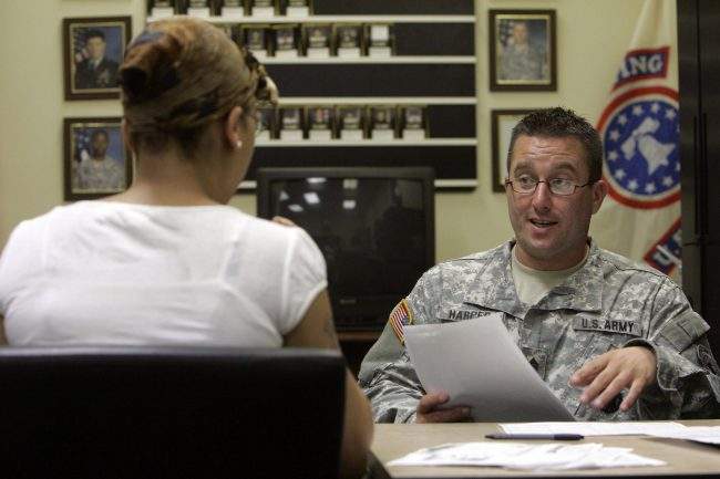 A prospective soldier meets with a U.S. Army recruiters at the U.S. Army Recruiting Station in Upper Darby, Pa., Aug. 8, 2007.