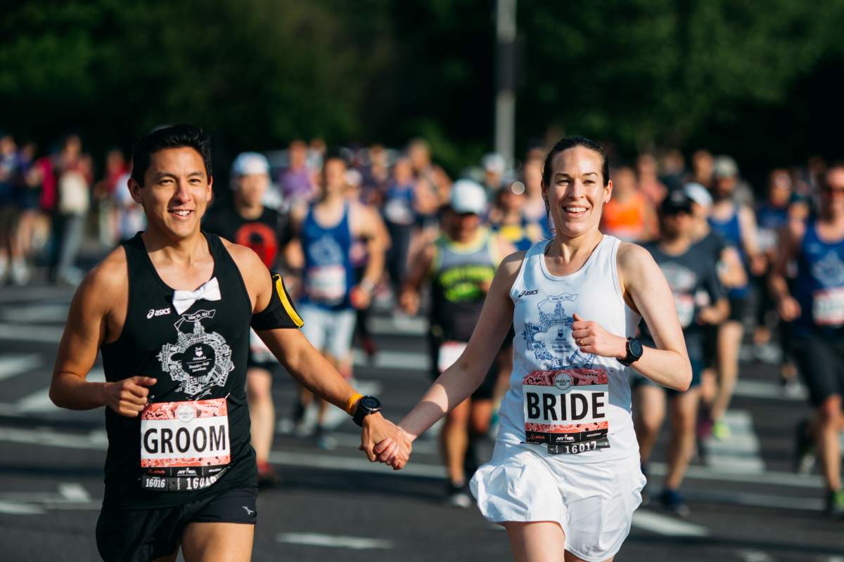 couple running wedding