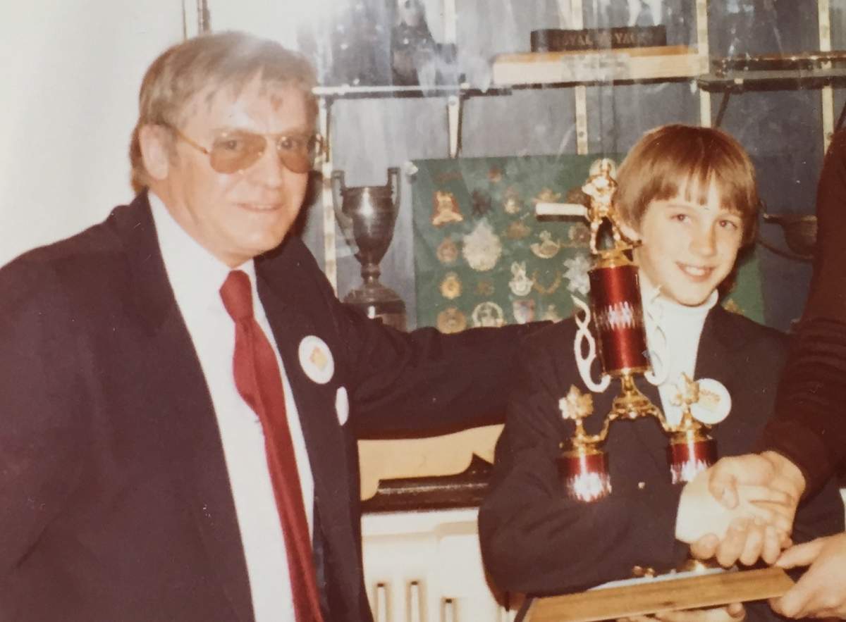 An undated photo of Doug Ellis with his coach John Garland (left).