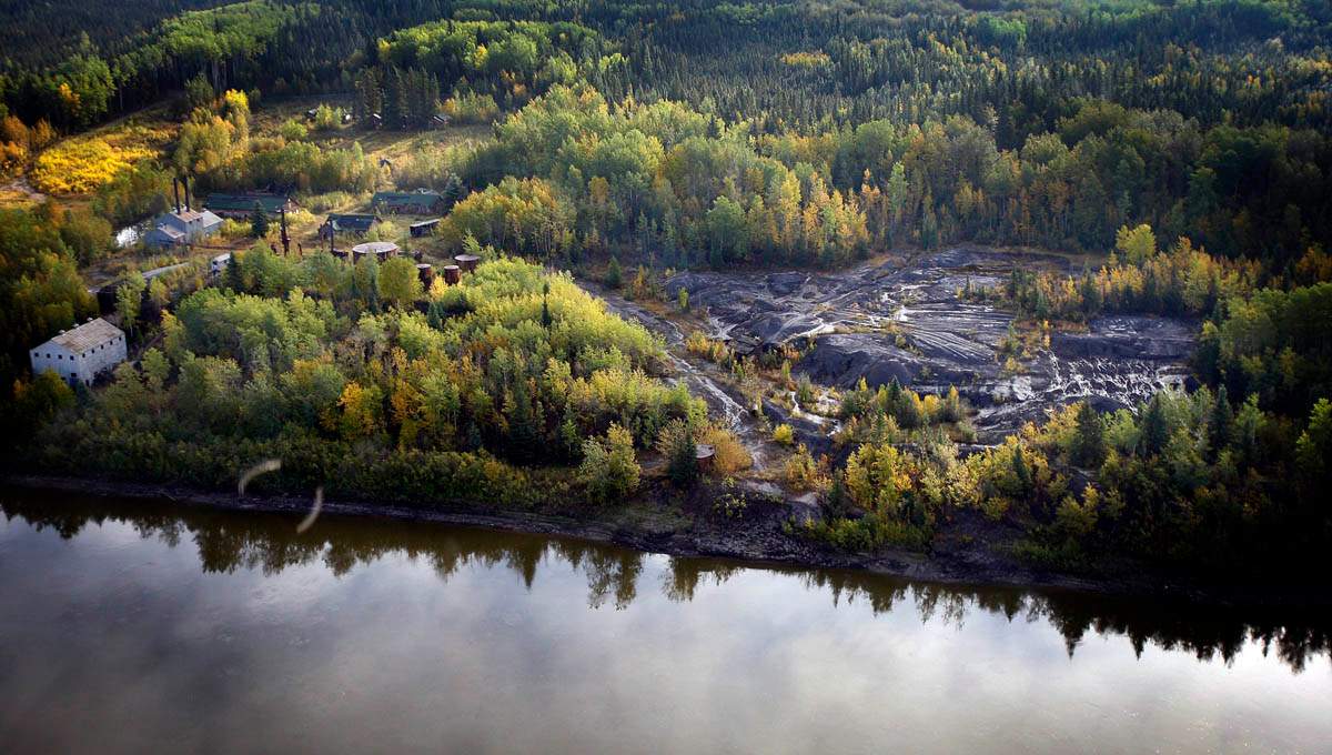 Alberta’s first oilsands operation (called Bitumont) on the shore of Athabasca River, is seen from the air near Fort McMurray, Alta., Monday, Sept. 19, 2011. THE CANADIAN PRESS/Jeff McIntosh