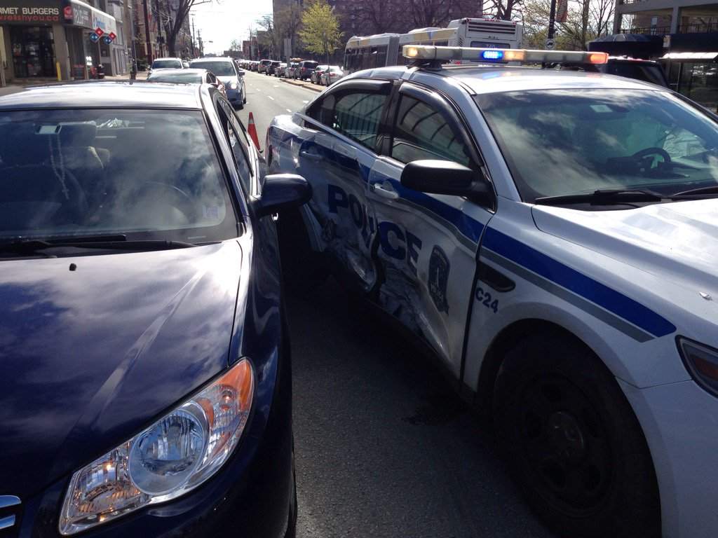 A damaged police vehicle at the intersection of Quinpool at Robie in Halifax, N.S.