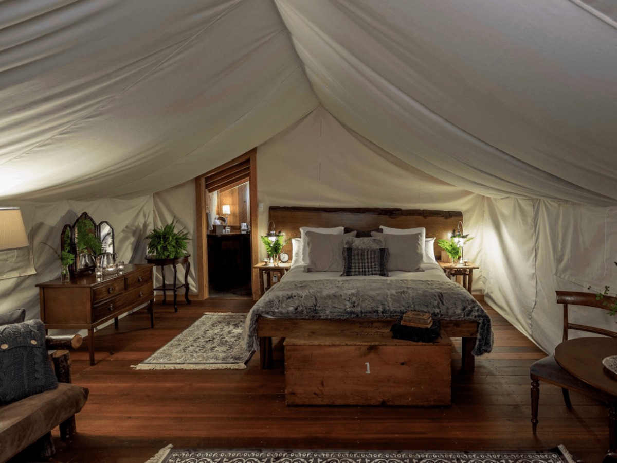 Luxury tents on the resort include private bathrooms and upscale furnishings.