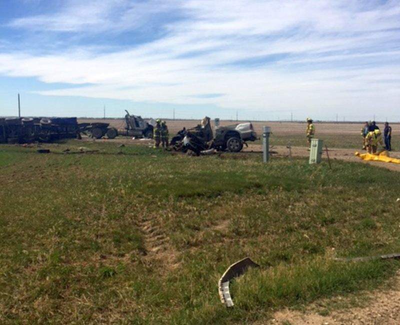 Emergency crews attend a crash in the intersection of Township Road 100 and Range Road 192 on Thursday, May 4, 2017. 