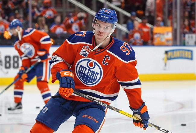 Edmonton Oilers' Connor McDavid (97) takes part in warm up before taking on the San Jose Sharks during NHL playoff action in Edmonton, Alta., on April 14, 2017. 