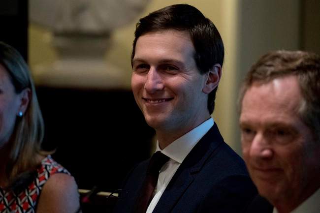 White House Senior Adviser Jared Kushner, centre, accompanied by U.S. Trade Representative Robert Lighthizer, right.