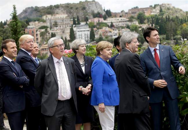 From left, French President Emmanuel Macron, U.S. President Donald Trump, President of the EU Council Donald Tusk, President of the EU Commission Jean-Claude Juncker, British Prime Minister Theresa May, German Chancellor Angela Merkel, Italian Prime Minister Paolo Gentiloni and Canadian Prime Minister Justin Trudeau.
