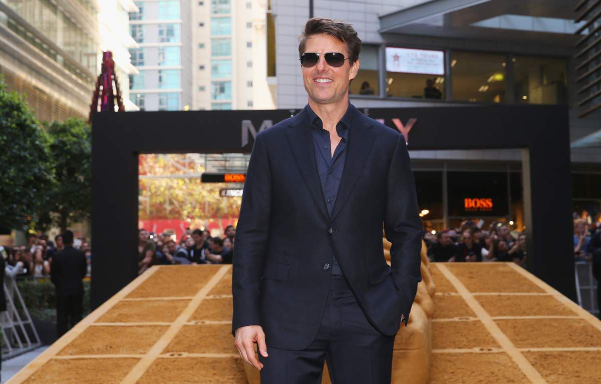 Tom Cruise gestures towards the crowd during a photo call for The Mummy at World Square on May 23, 2017 in Sydney, Australia.