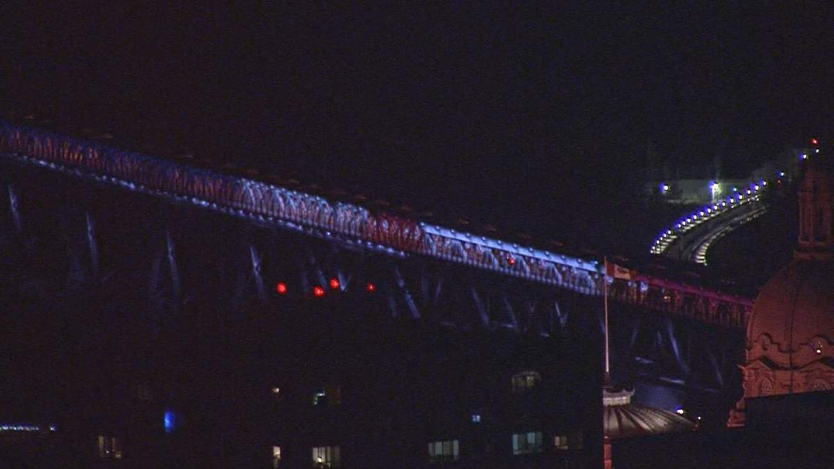 Edmonton’s High Level Bridge was lit up in red, white and blue to honour the victims of the Manchester terror attack in England.