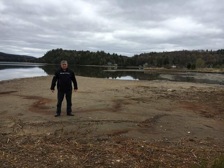 Yvon Blanchard, director-general of the municipality of Lac-Sainte-Marie, stands on the lake bed on May 9, 2017.