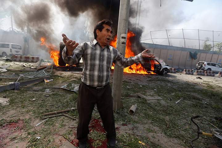 A man reacts at the site of a blast in Kabul, Afghanistan May 31, 2017.
