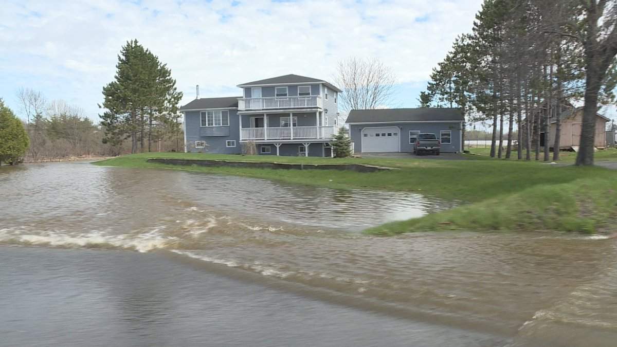 Roads in Maugerville, N.B., were closed along Route 105 due to flooding on May 7, 2017.