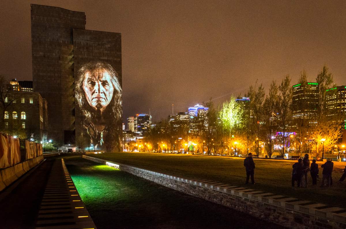 A projection on Montreal's courthouse as part of the Cité Mémoire installations.