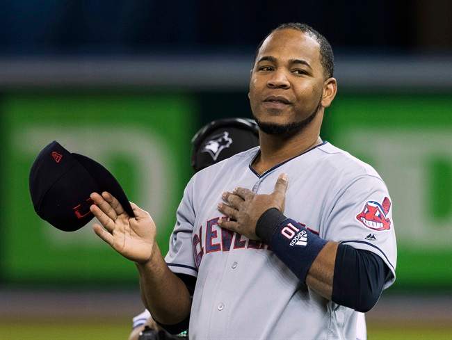 Cleveland Indians designated hitter Edwin Encarnacion (10) acknowledges the crowed during after a video tribute to the former Toronto Blue Jays player before playing against Blue Jays during first inning AL baseball action in Toronto on Monday, May 8, 2017. THE CANADIAN PRESS/Fred Thornhill.