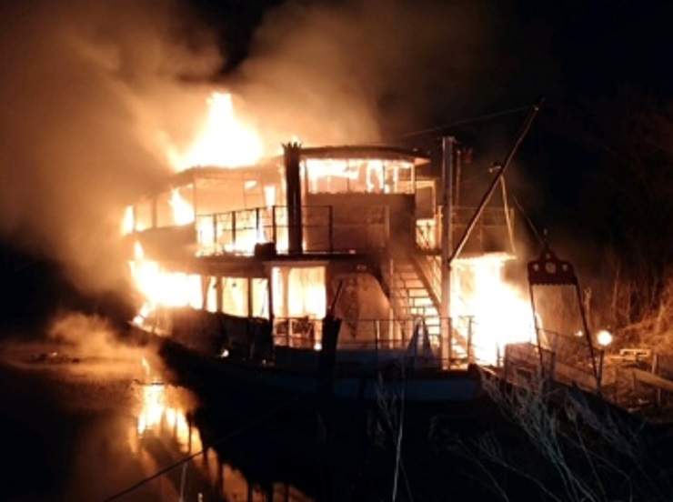 Flames engulf the Paddlewheel Princess in Selkirk early Tuesday morning.