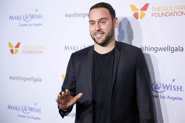 In this Dec. 7, 2016, file photo, Scooter Braun arrives at the 4th Annual Wishing Well Winter Gala at the Hollywood Palladium in Los Angeles, Calif.