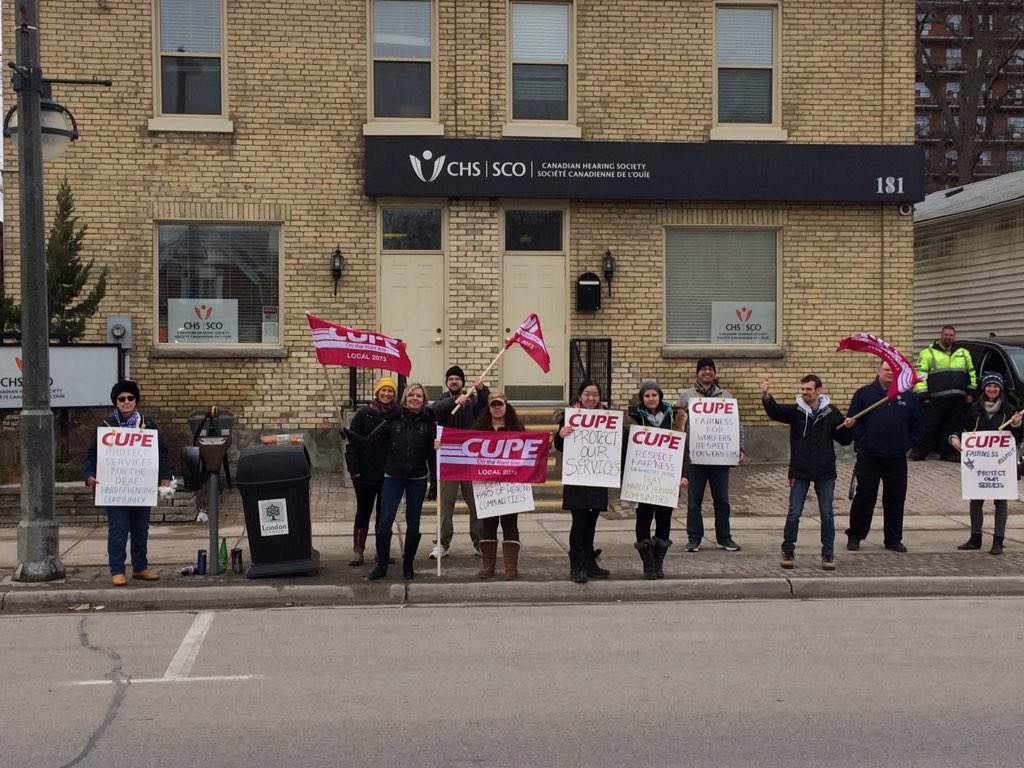 Workers protest outside the London branch of the Canadian Hearing Society on March 6, 2017.