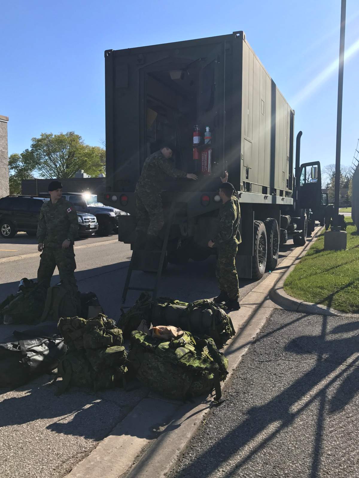 Reservists from 31 Canadian Brigade Group load and marshal vehicles in at Wolseley Barracks, London, in preparation of their move to Kingston, where they will be prepared to support in flood relief when they receive the request for assistance, on 8 May 2017.