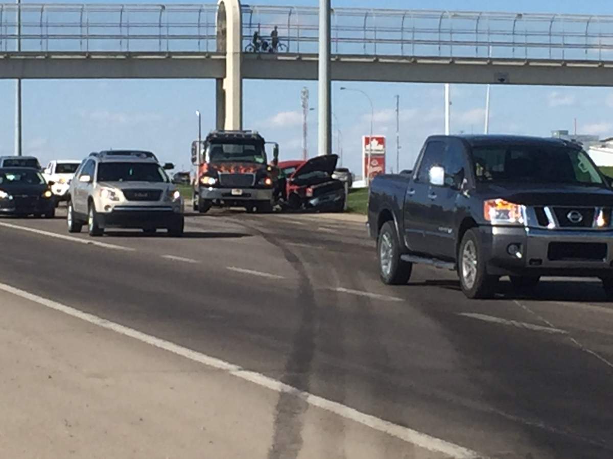 A semi truck collided with a parked pickup truck on Highway 2 Saturday. 