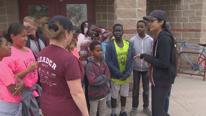 Members of the Sister MacNamara Elementary School run club prepare for a training session.