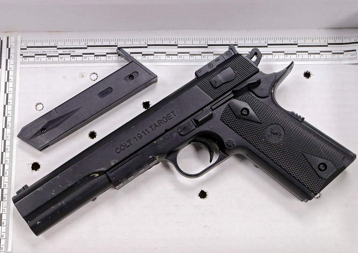  In this Nov. 26, 2014, file photo, a fake handgun resembling a Colt 1911 pistol, taken from Tamir Rice after he was fatally shot by Cleveland police, is displayed after a news conference in Cleveland.