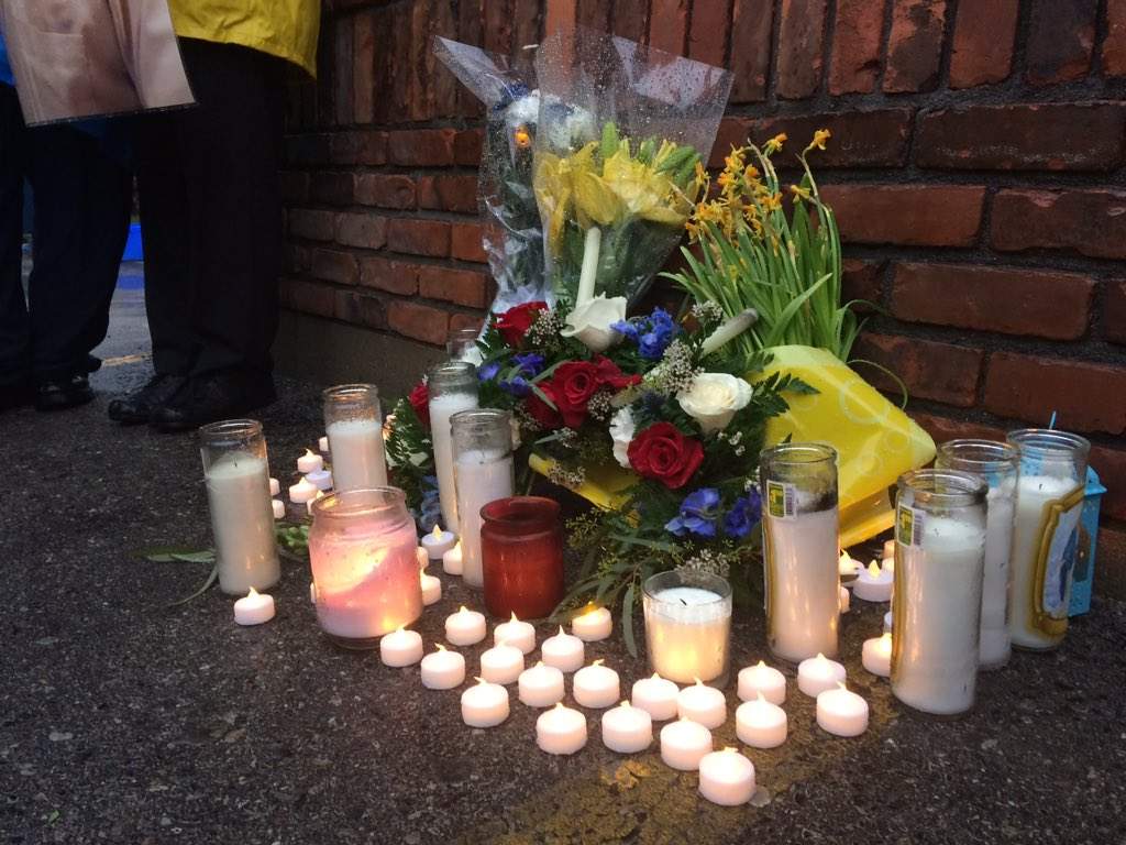 A memorial for Vijay Bhatia sits in the Mac's Milk parking lot where the cab driver was brutally assaulted by a customer.