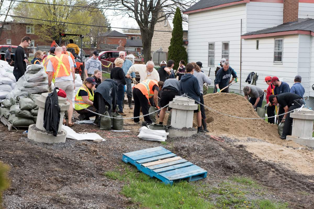 Volunteers help flood victims in Île Bizard in Montreal's West Island.