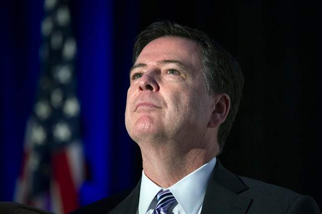 In this March 29, 2017 file photo, FBI Director James Comey addresses the Intelligence and National Security Alliance Leadership Dinner in Alexandria, Va.
